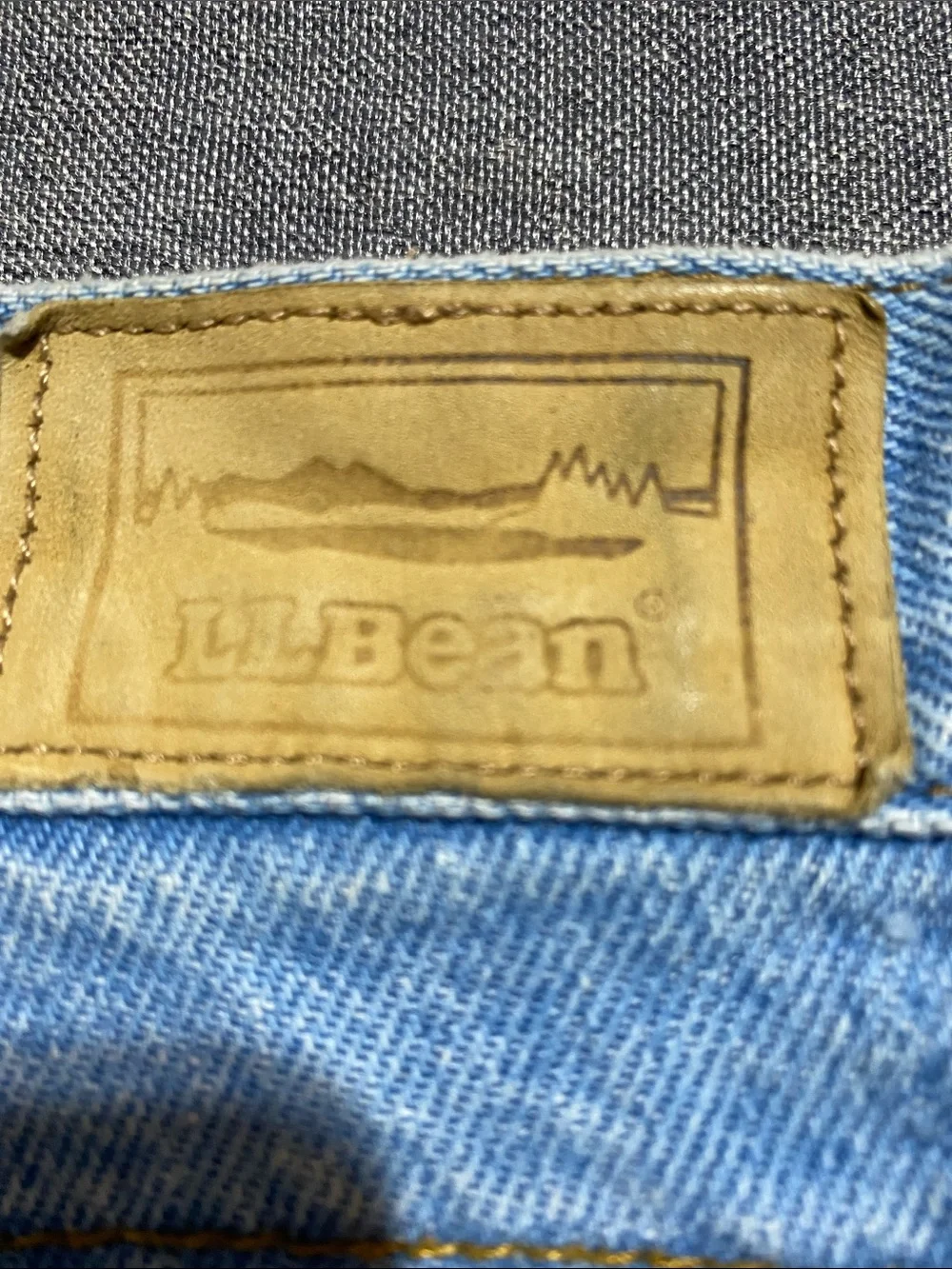L.L. Bean Light Blue Denim Jeans with Green & Navy Plaid Lining
